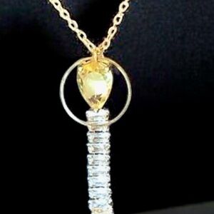 Elegant Gold and Silver Pendant Necklace With Channeled Baguettes. NWT